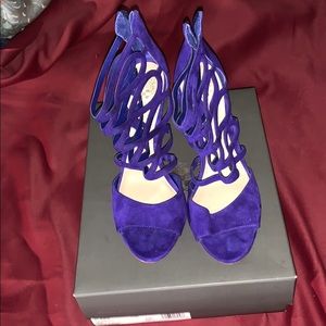 Brand new, beautiful blue Suede cage sandals.